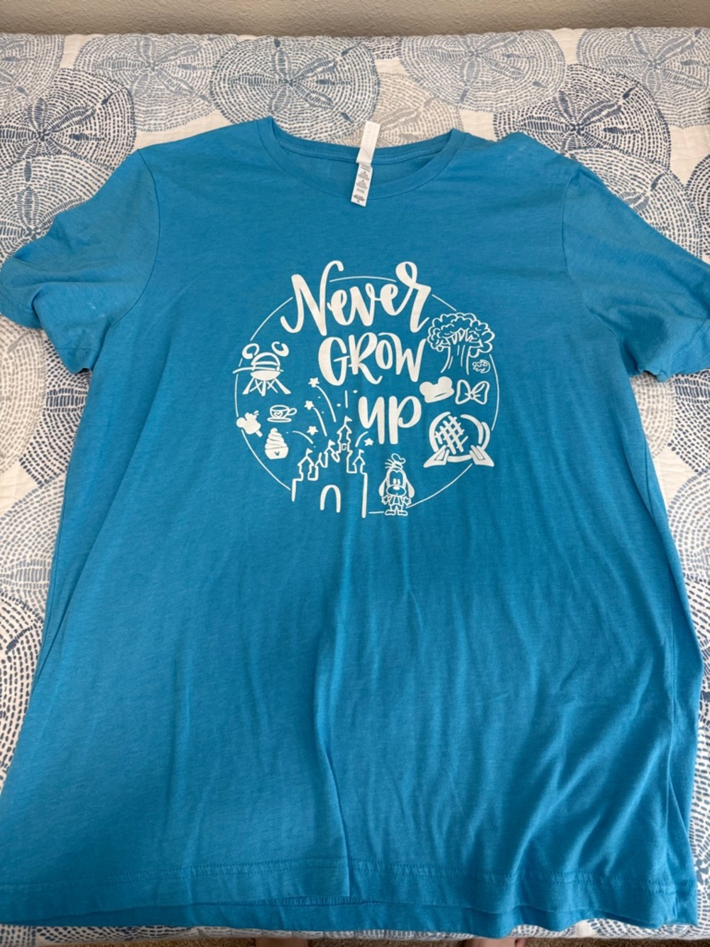 Bella Canvas Teal Blue 'Never Grow Up' Disney Graphic Tee